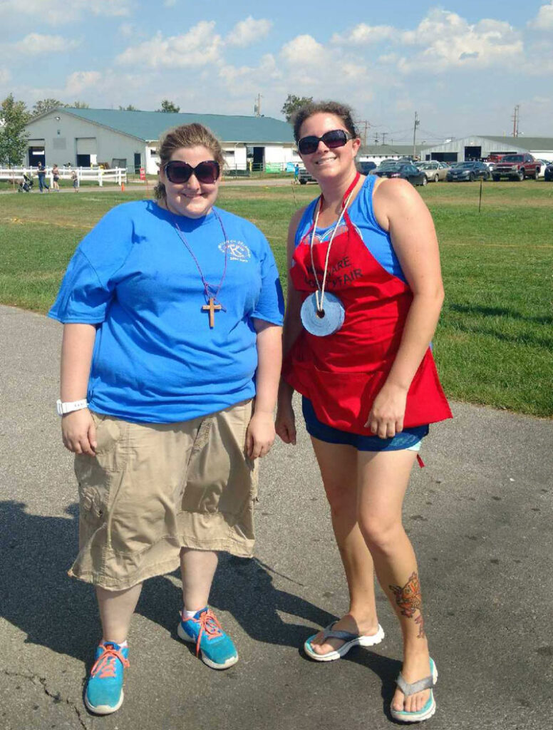 The Alpha Group Supportive Living, two people smiling together outside